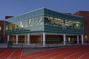 Michigan's Novi High School Fitness Center features a glass and metal curtainwall by Tubelite Inc. Credit: John Heider