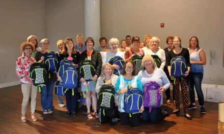 AAMA and World Vision fill 500 backpacks with supplies for in-need children