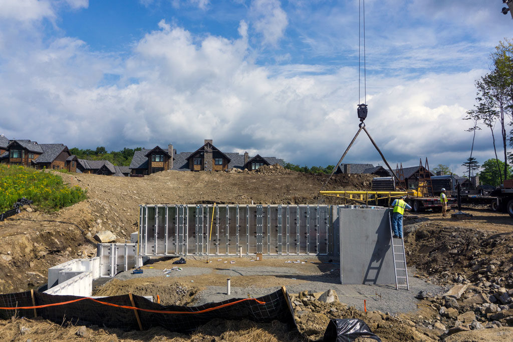 New townhouses at the Hermitage Club, Wilmington, Vt., constructed with superior walls precast concrete foundations.