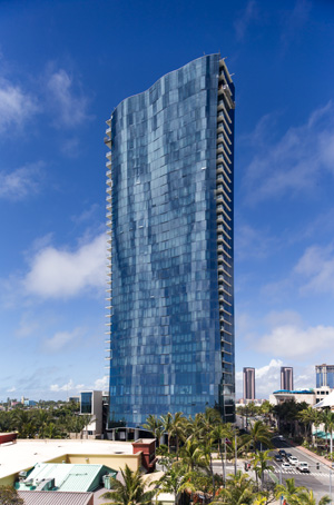 Cutline: Waiea Tower in Honolulu, Hawaii features Guardian SunGuard® SNR 43 coating on CrystalGray® glass. SunGuard SNR 43 coated glass is part of Guardian Glass’ processed glass EPD, and CrystalGray glass is included in the flat glass EPD. Photo: Marco Garcia