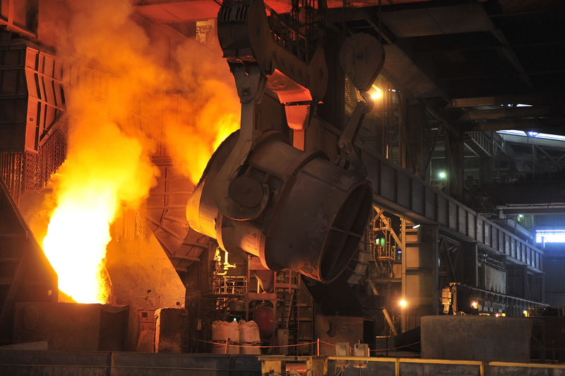 Ore smelting in a blast furnace.