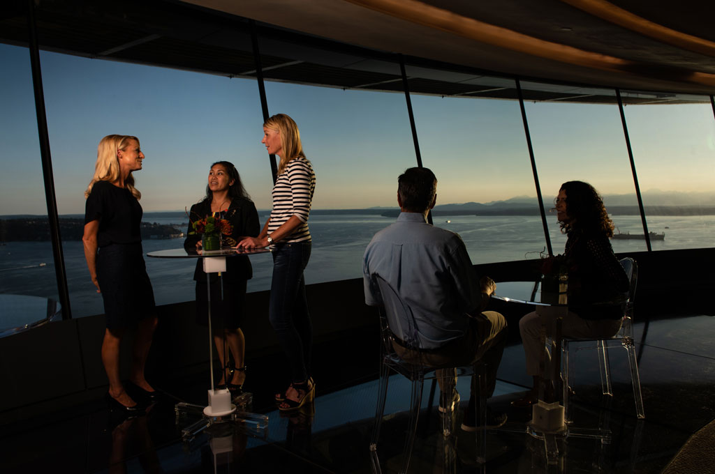 Enjoying the sunset at the Atmos Wine Bar. Courtesy of Space Needle and Rod Mar