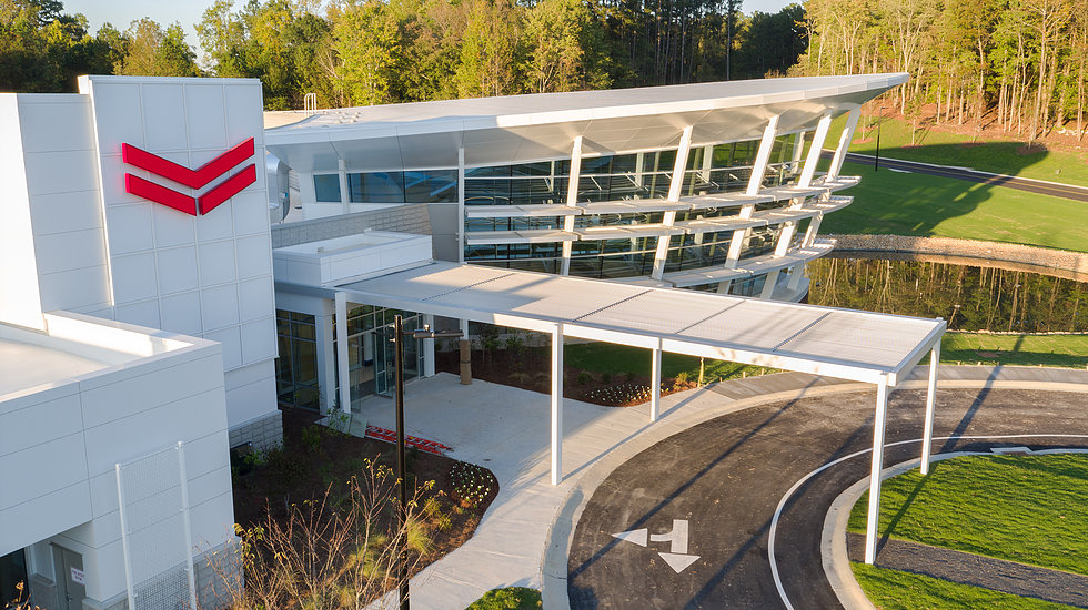 Yanmar Corporation's headquarters in Atlanta, Ga. gives a nod to nautical style with a dramatic 35 ft., three-sided conical-shaped curtain wall. Courtesy of YKK AP America Inc.
