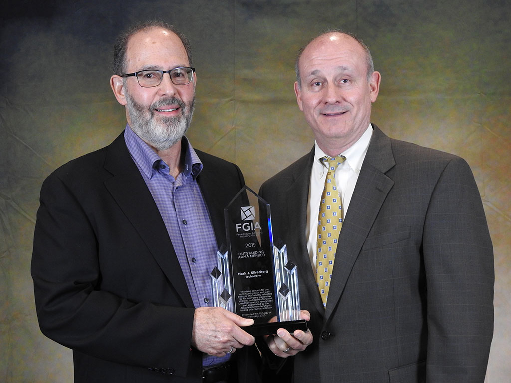 Mark Silverberg, President of Technoform North America, was awarded the Fenestration Outstanding Service Award. He was presented with his award by Donnie Hunter, Director of Global Product Management for Kawneer.