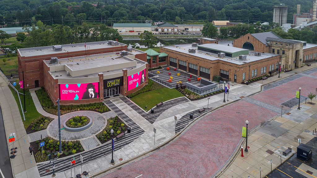 Exterior of the National Comedy Center campus showcasing the historic train station on the far right with connector wing leading into the museum on the left. Photo credit: Paul Gibbens, Gibbens Creative; courtesy of E.E. Austin & Son, Inc.